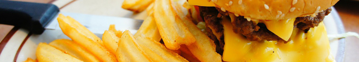Eating Burger Fast Food at Original Tommy's World Famous Hamburgers restaurant in Ventura, CA.